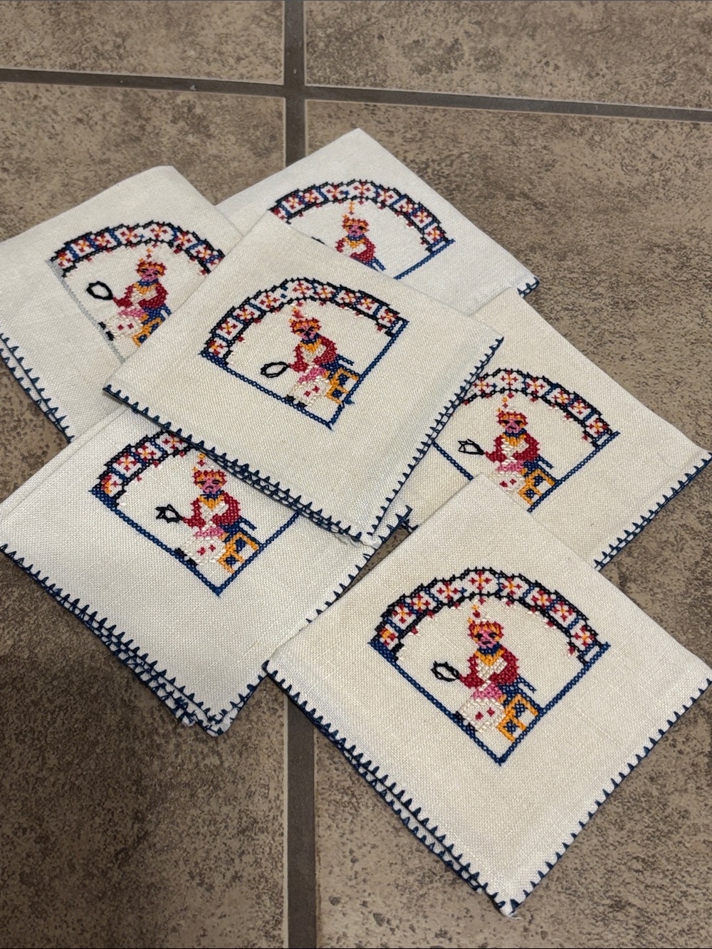 Bundle of six embroidered square handkerchiefs